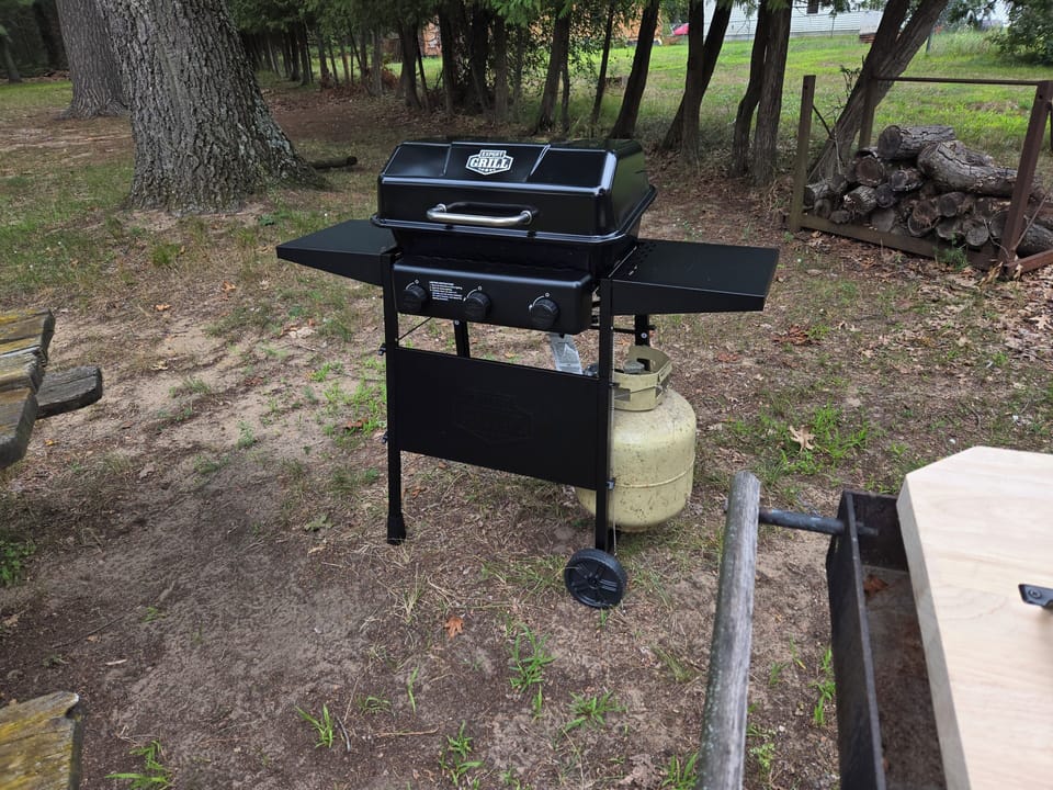 EXTERIOR:  The backyard propane grill