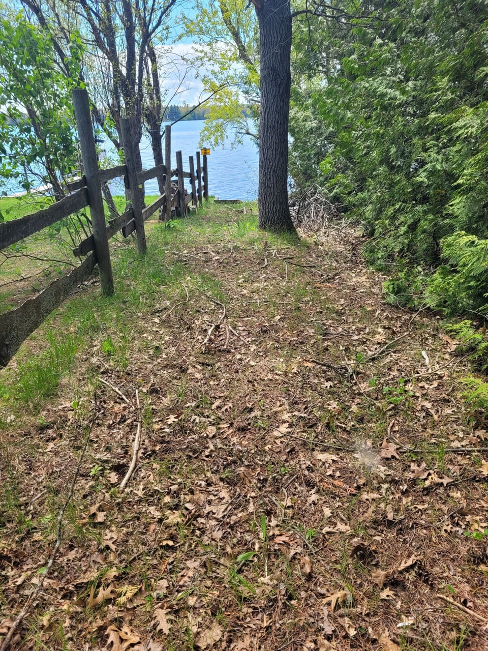 EXTERIOR:  The view of Van Etten Lake from the pathway for private lake access
