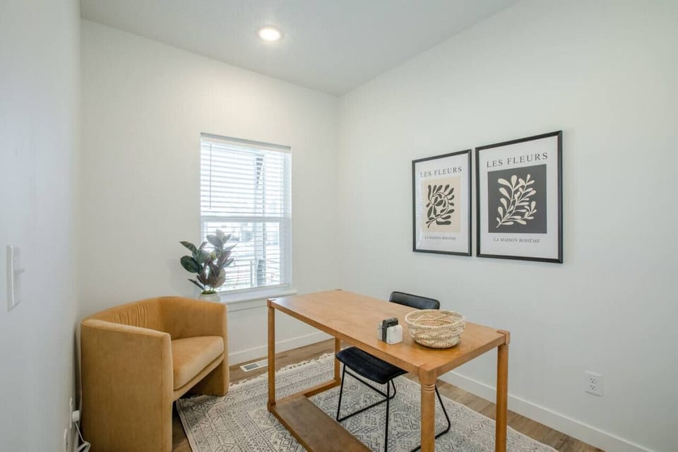 Dedicated office room with natural light and minimal décor — ideal for remote work or planning your next Utah adventure.