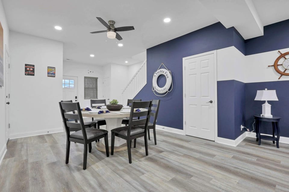 The dining area is open to both the living room and kitchen, creating a bright, welcoming space that's perfect for enjoying meals together and staying connected while you cook, dine, and relax.