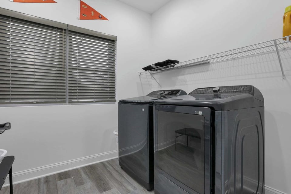 The upstairs laundry room is conveniently located next to the primary suite.