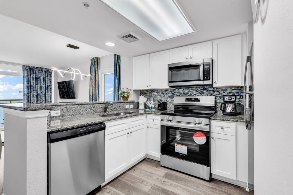 Signature Condo, 2 Bedrooms, Beach View, Beachfront | Private kitchen | Fridge, microwave, oven, stovetop