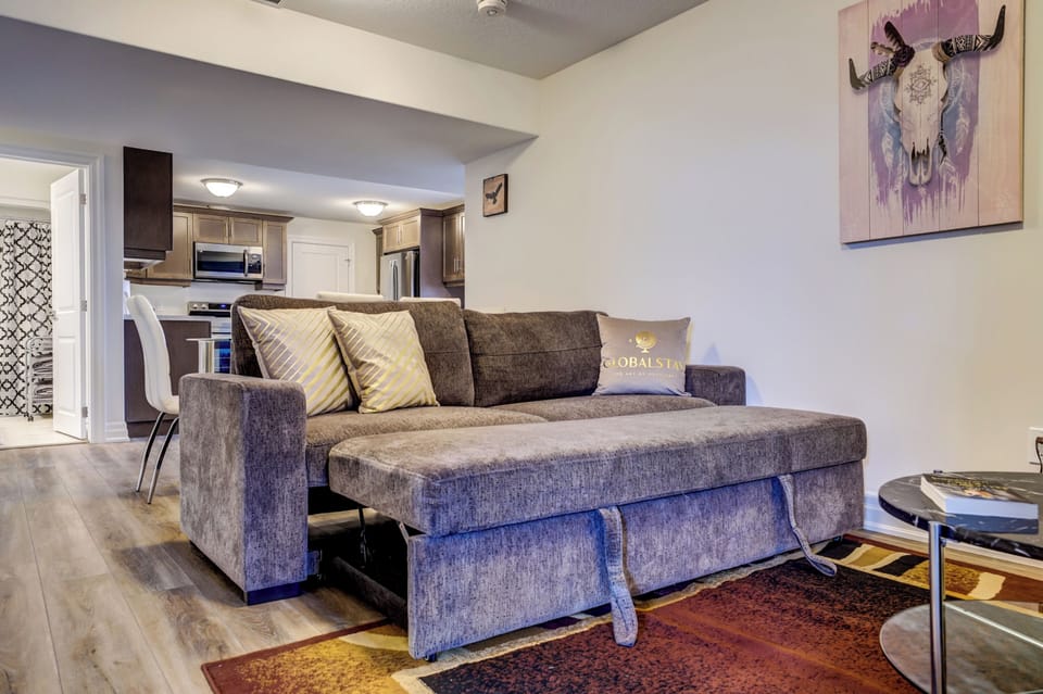 Family Apartment, 4 Bedrooms, Kitchen, Courtyard View | Living area | 43-inch flat-screen TV with digital channels, fireplace, Netflix