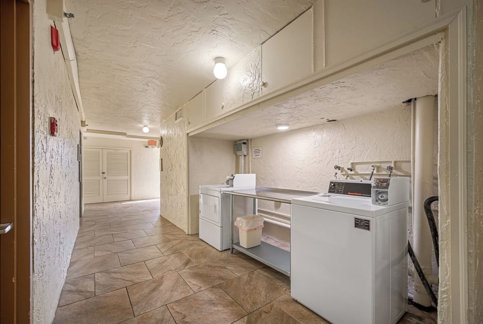Complex Washer & Dryers located on each floor by the elevator