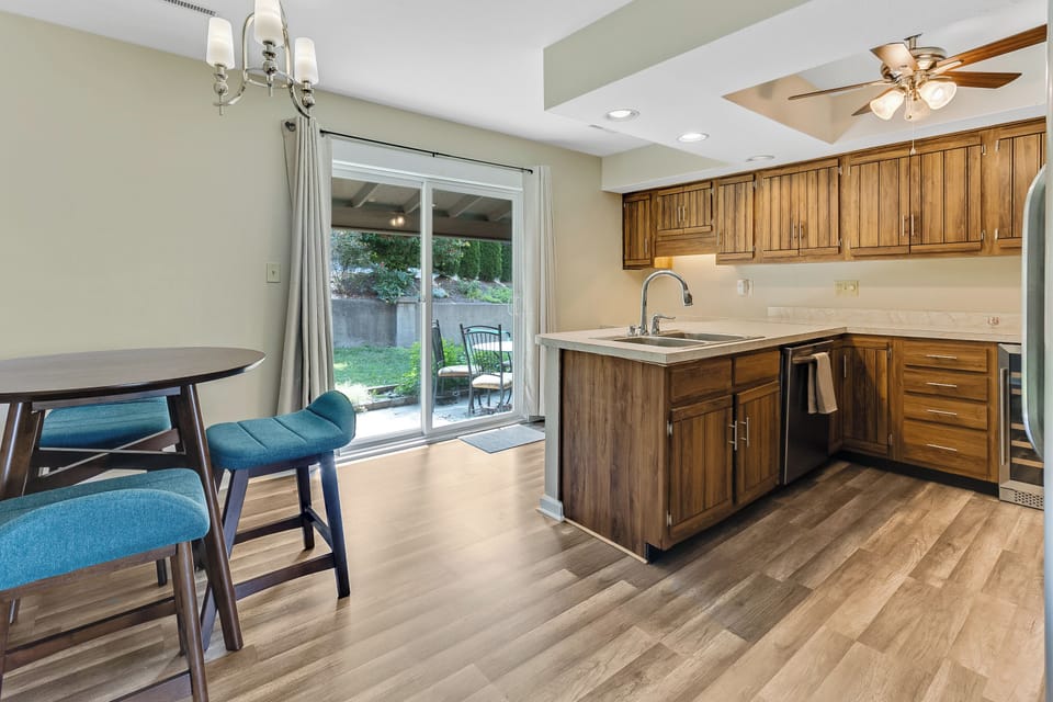 Full kitchen with stainless steel appliances — cook like home