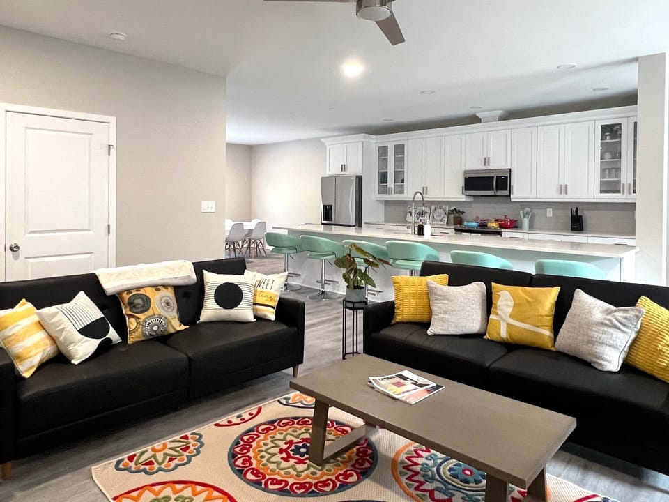 The living room has a large HD television and 3 sofas that convert into beds.