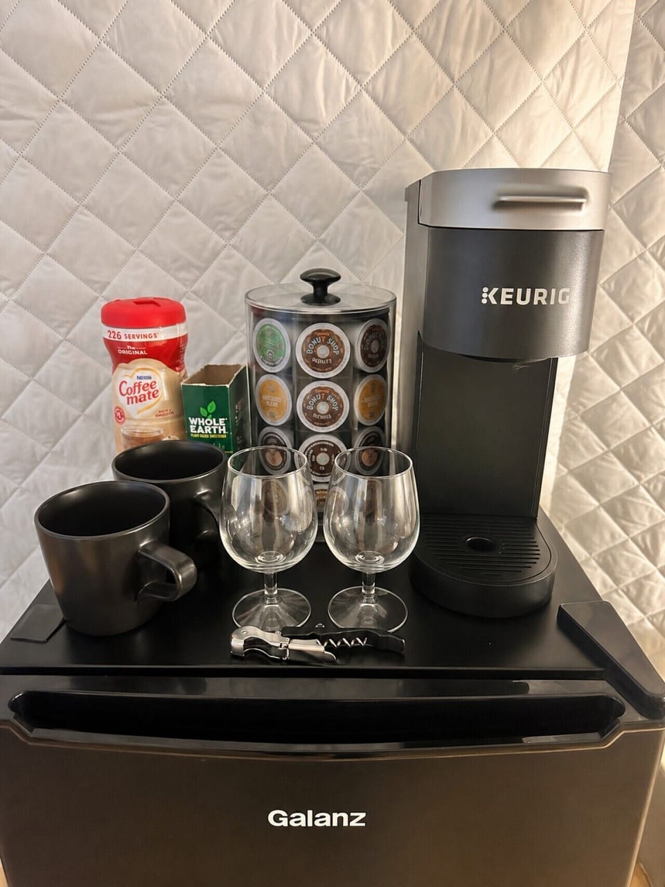 Mini fridge, freezer, coffee, cups, sugar, creamer, and more