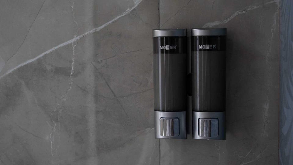Deluxe Room, Patio | Bathroom | Shower, hair dryer, bidet, towels