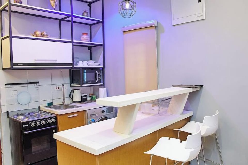 Junior Apartment, Balcony, City View | Private kitchen | Fridge, microwave, oven, stovetop