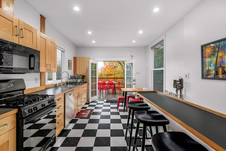 Full sized, open kitchen with all your cooking essentials.