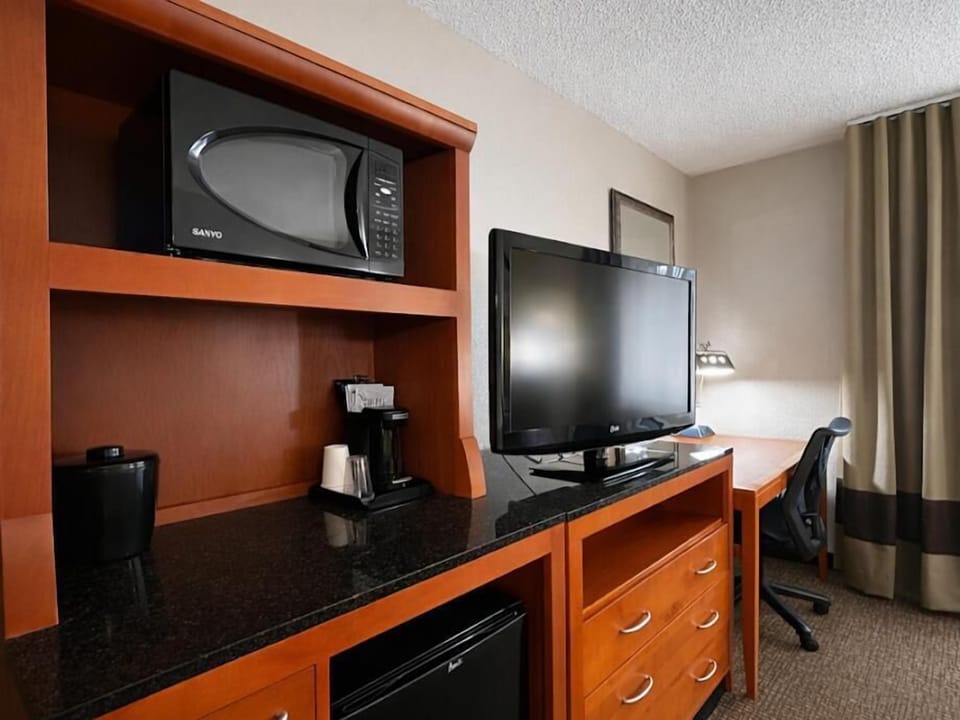 Desk, soundproofing, iron/ironing board, free cribs/infant beds