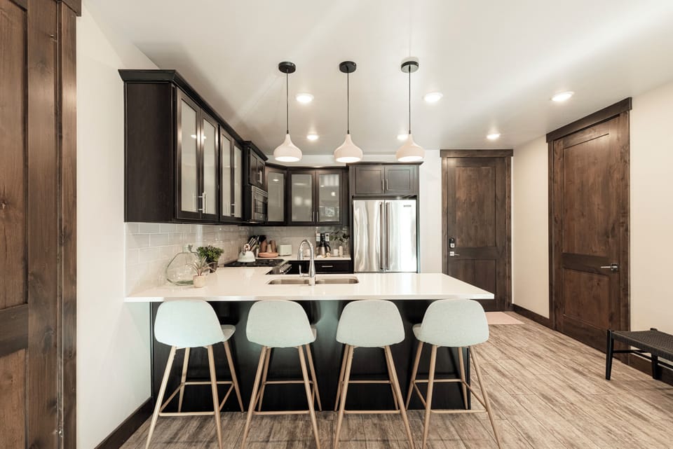Condo entry and kitchen