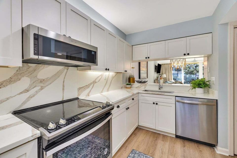 King & Prince 176 Renovated Kitchen with stainless steel appliances