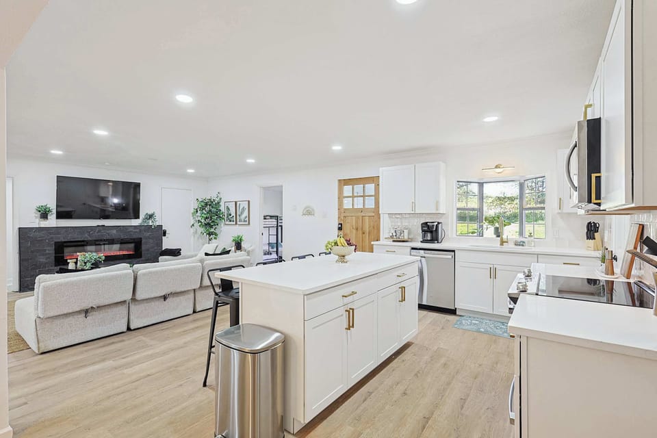 Open kitchen seamlessly flowing into living room