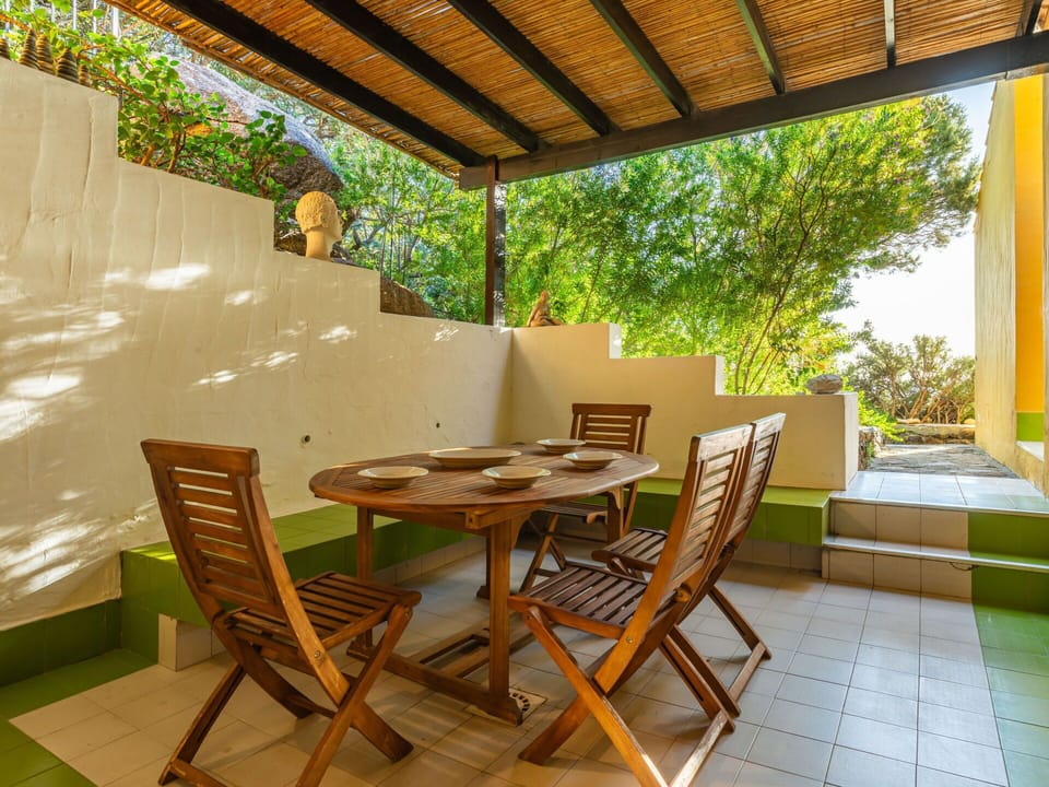 Furniture, Table, Property, Building, Chair, Plant, Wood, Shade, Interior Design, Outdoor Furniture