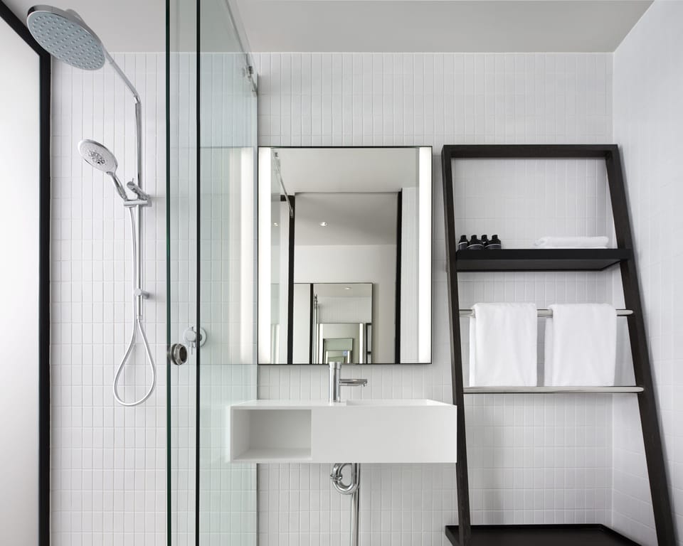 Shower, rainfall showerhead, designer toiletries, hair dryer