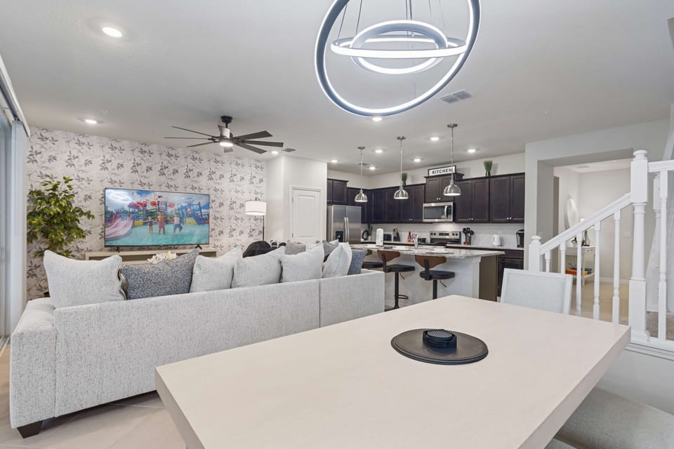 Gather around the table and enjoy meals in a warm, inviting space perfect for conversation and connection.
