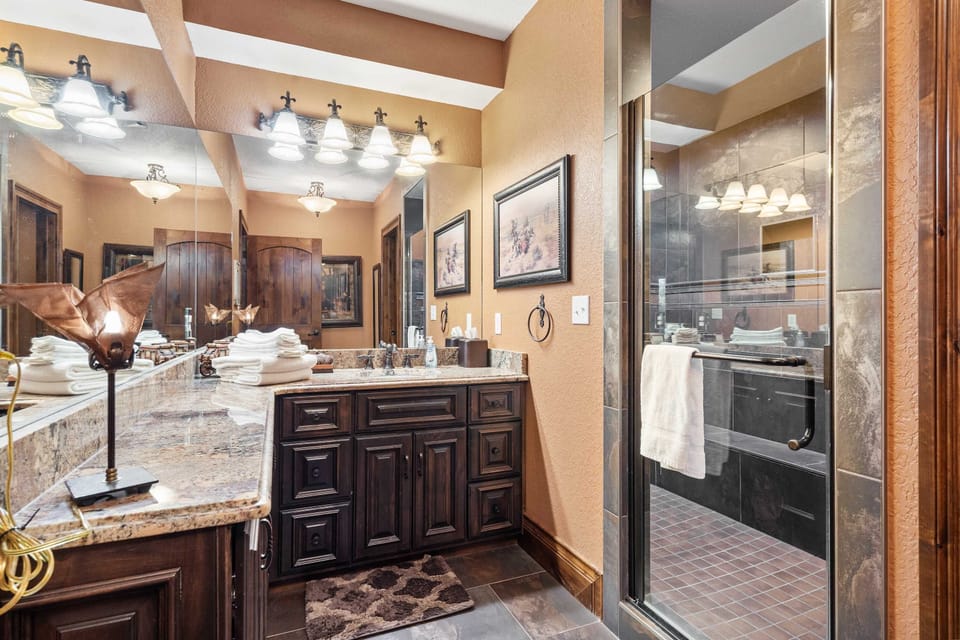Refresh in the queen ensuite, offering ample counter space & a glass shower