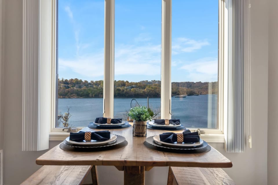 Gather for meals together with a lake view at the dining table, seating 4