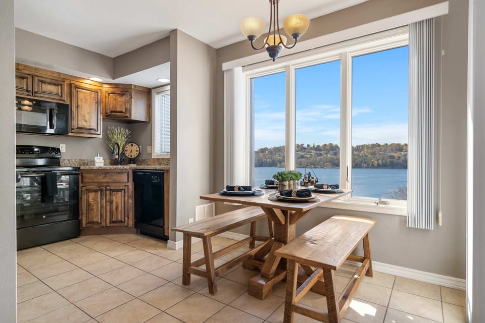 Gather for meals together with a lake view at the dining table, seating 4