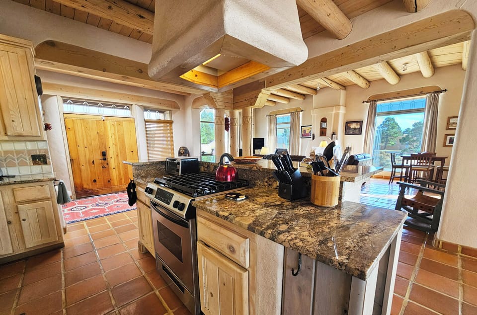 Fully equipped kitchen overlooks the living area