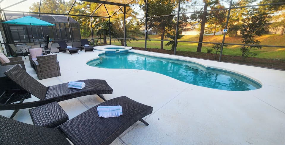 Soak up the sun or cool off in this private, screened-in pool your personal slice of paradise.