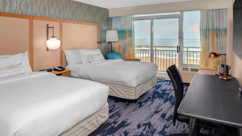 Premium bedding, down comforters, desk, laptop workspace