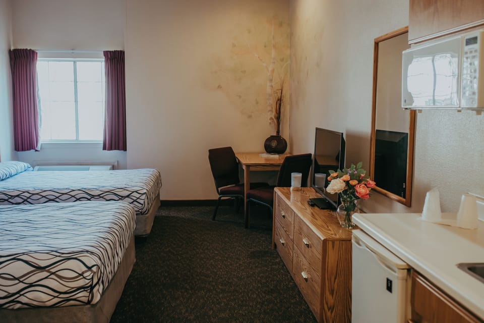 Standard Room, 2 Queen Beds | Pillowtop beds, desk, free WiFi, bed sheets