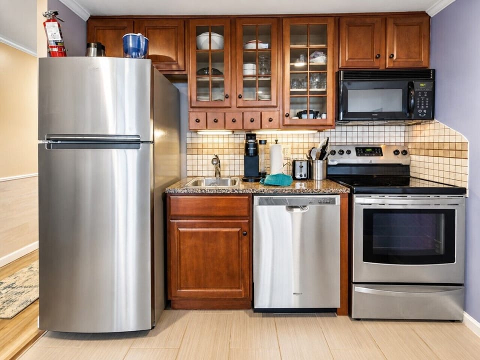 Kitchen is fully-equipped with pots, pans & utensils.