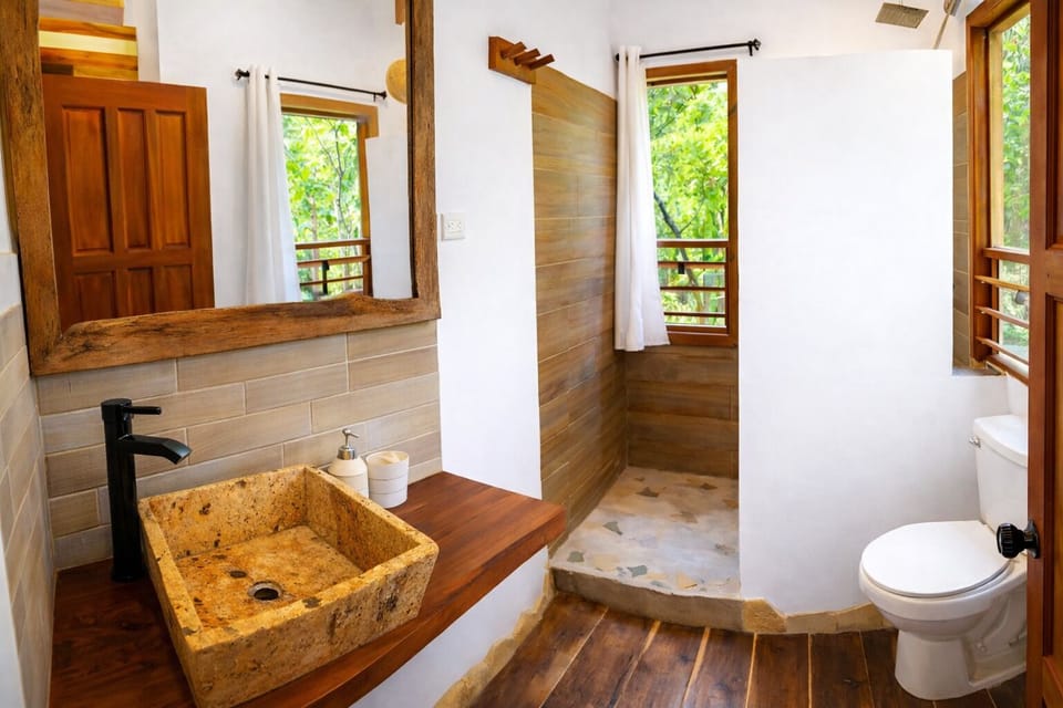 Family Bungalow, Garden View | Bathroom | Shower, rainfall showerhead, hair dryer, towels