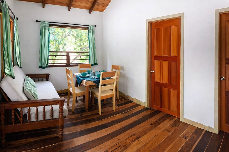 Family Bungalow, Garden View | Living area | 32-inch Smart TV with digital channels