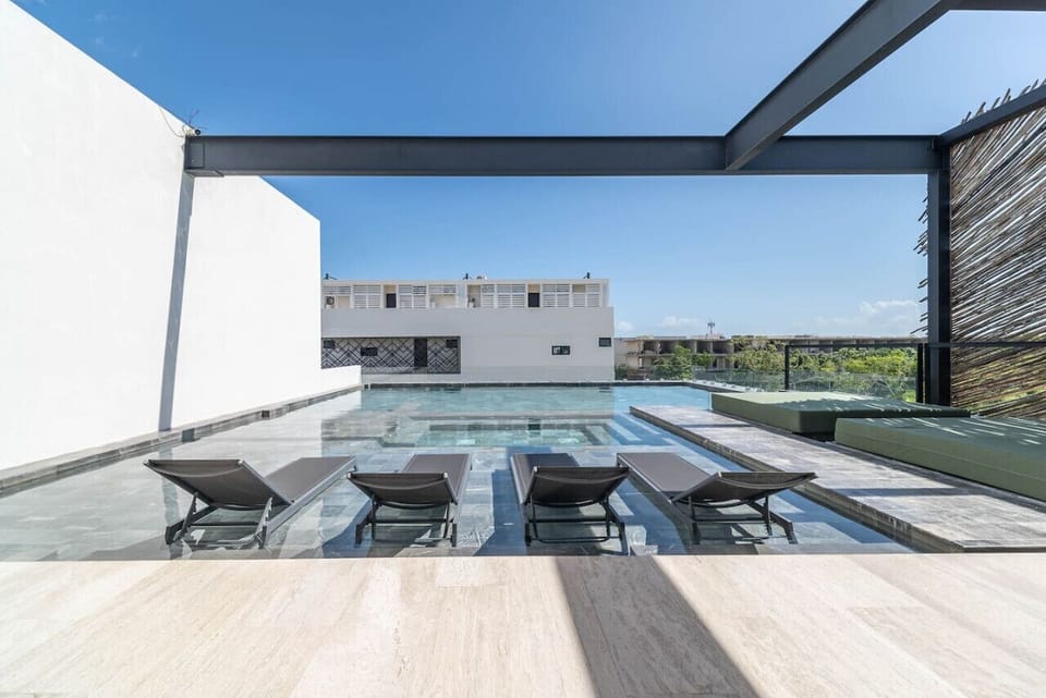 Splash around and make memories in this inviting pool, just steps from your door