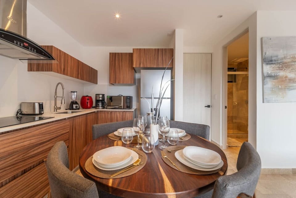 Conveniently located across from the kitchenette, this dining table is perfect for family meals