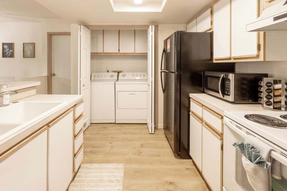Washer And Dryer Off Of Kitchen