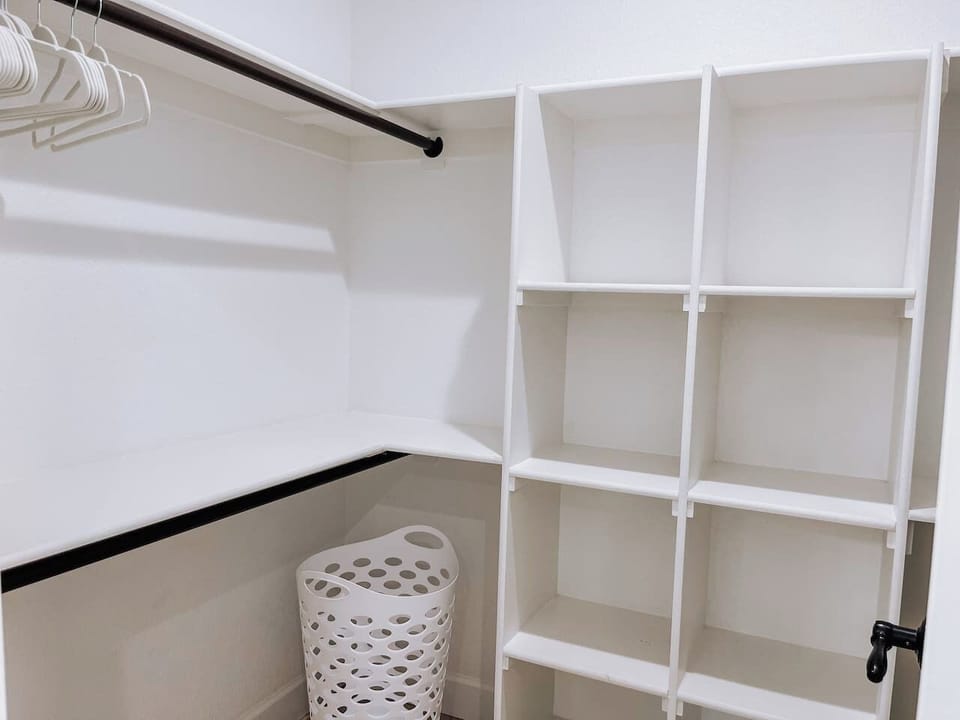 Master suite walk-in closet with ample storage