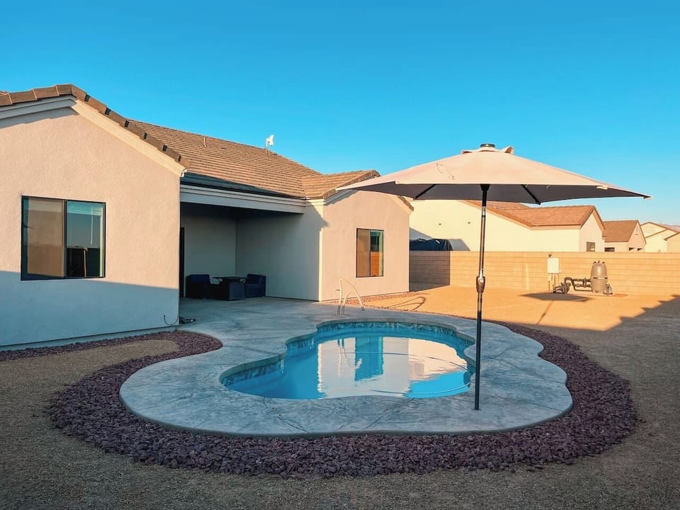 Private backyard pool. Perfect for relaxing and soaking up the sun