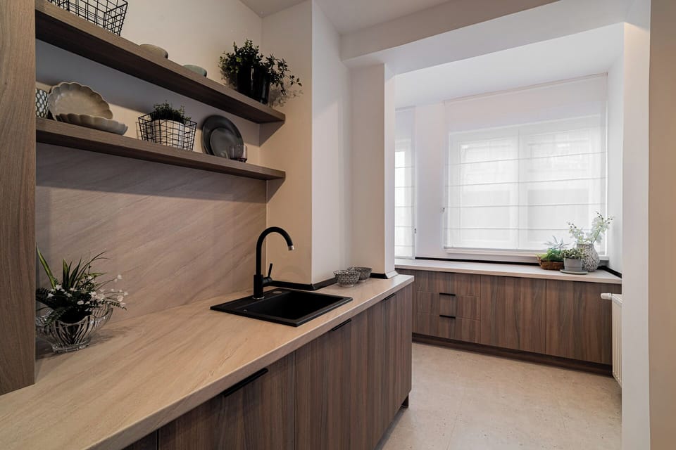 Deluxe Apartment, 4 Bedrooms, Balcony, City View | Private kitchen | Coffee/tea maker, electric kettle