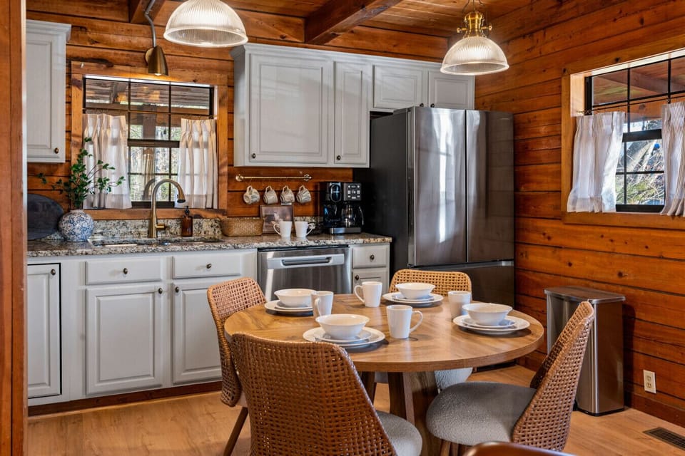 Chef-ready kitchen with stainless appliances, granite counter, Keurig & cookware