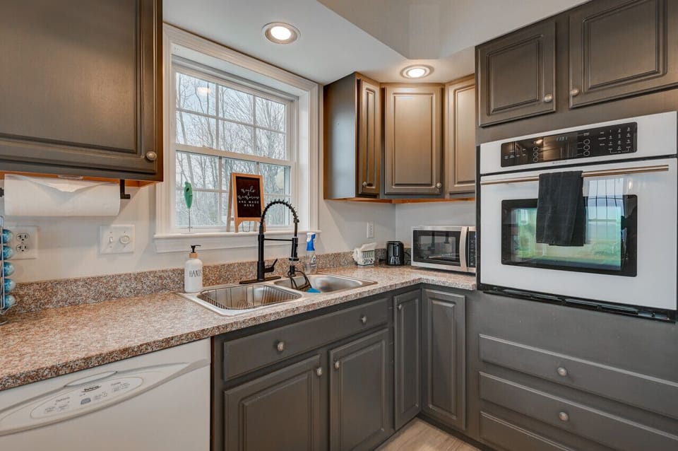 Spacious, well-equipped kitchen with everything you need to cook up a great meal—plus stunning views from every angle to enjoy while you prep, cook, or sip your morning coffee.