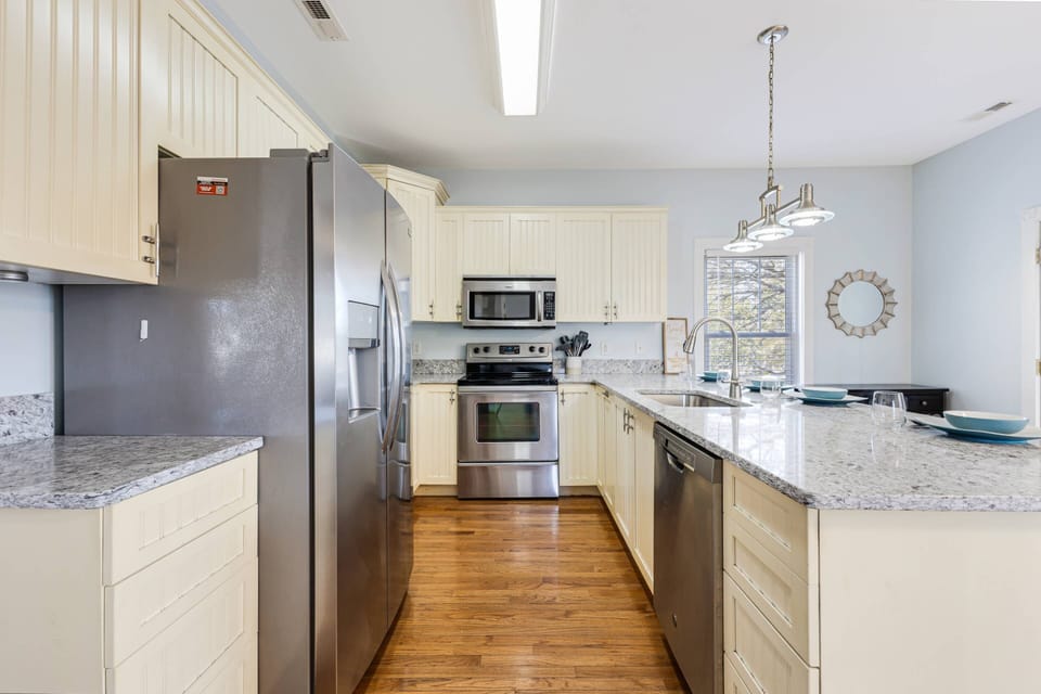 The kitchen is well-equipped with modern appliances and everything you need for easy meal preparation.