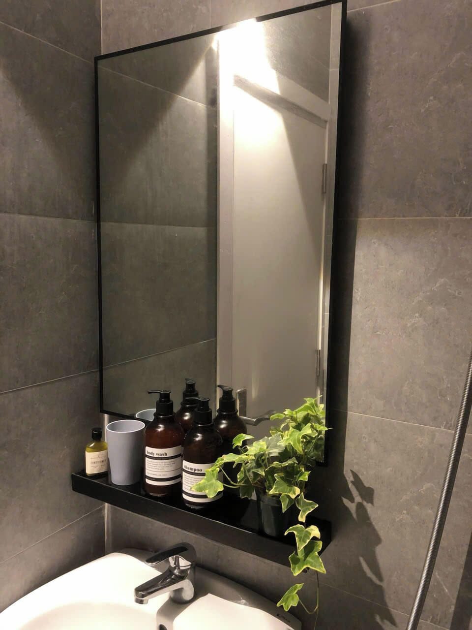 Shower, hair dryer, slippers, towels