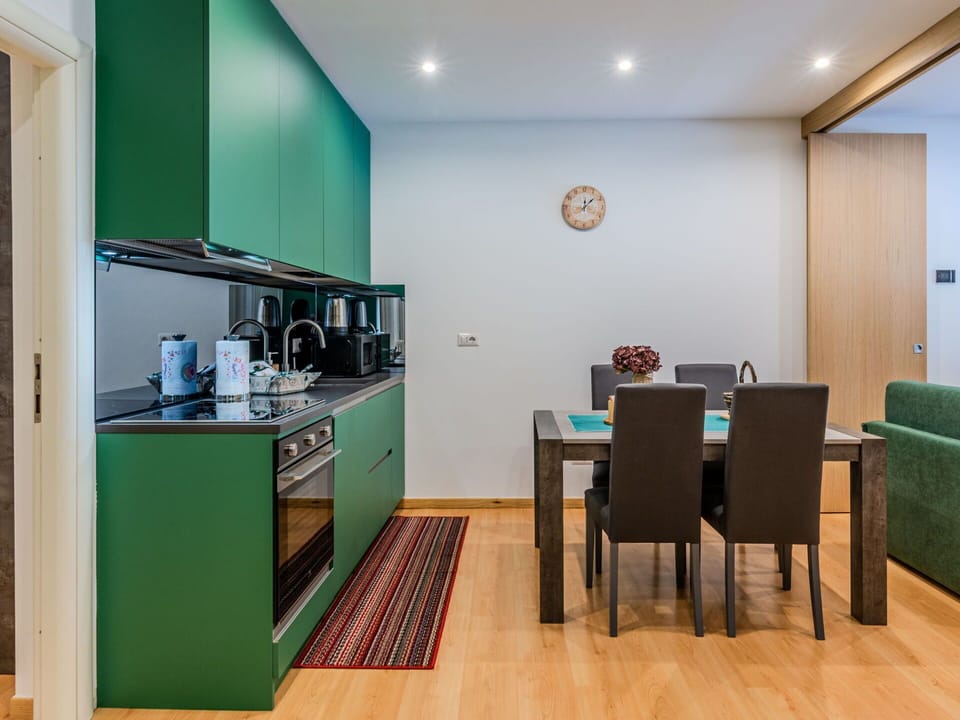 Interior Design, Flooring, Floor, Furniture, Wood, Ceiling, Room, Kitchen, Cabinetry, Lighting