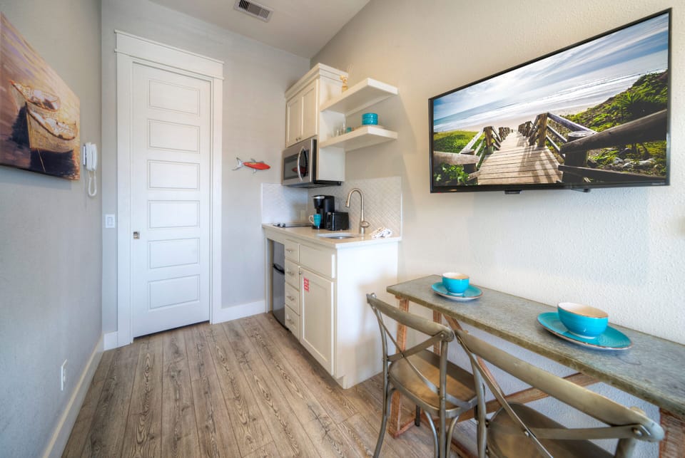 Convenient dining/vanity/desk space.