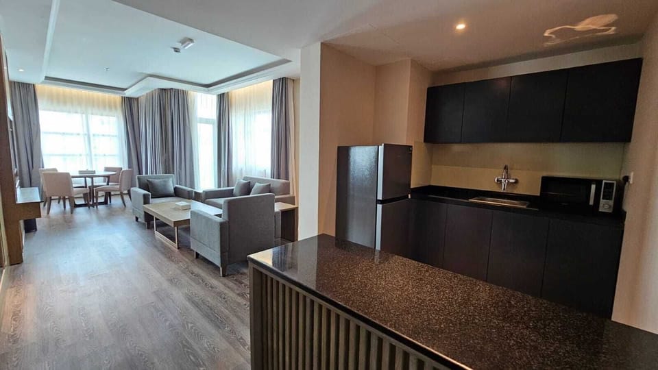 Luxury Suite, City View | In-room safe, desk, iron/ironing board, WiFi (free)