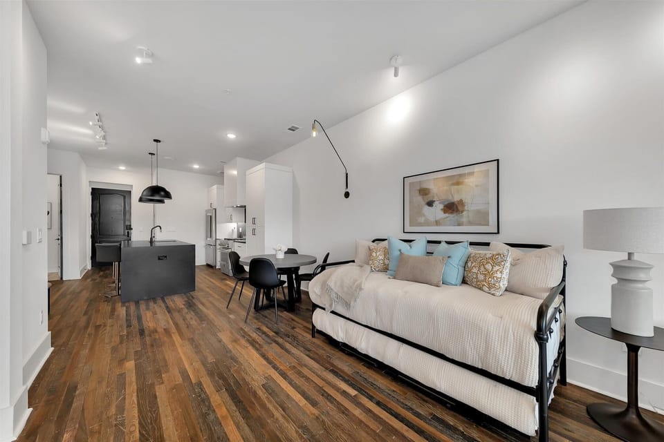 Spacious studio layout blending living, dining & kitchen into one airy space