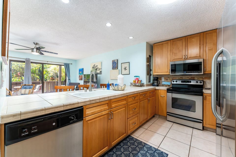 Kitchen - fully loaded with dishwasher, stove, oven, microwave and fridge