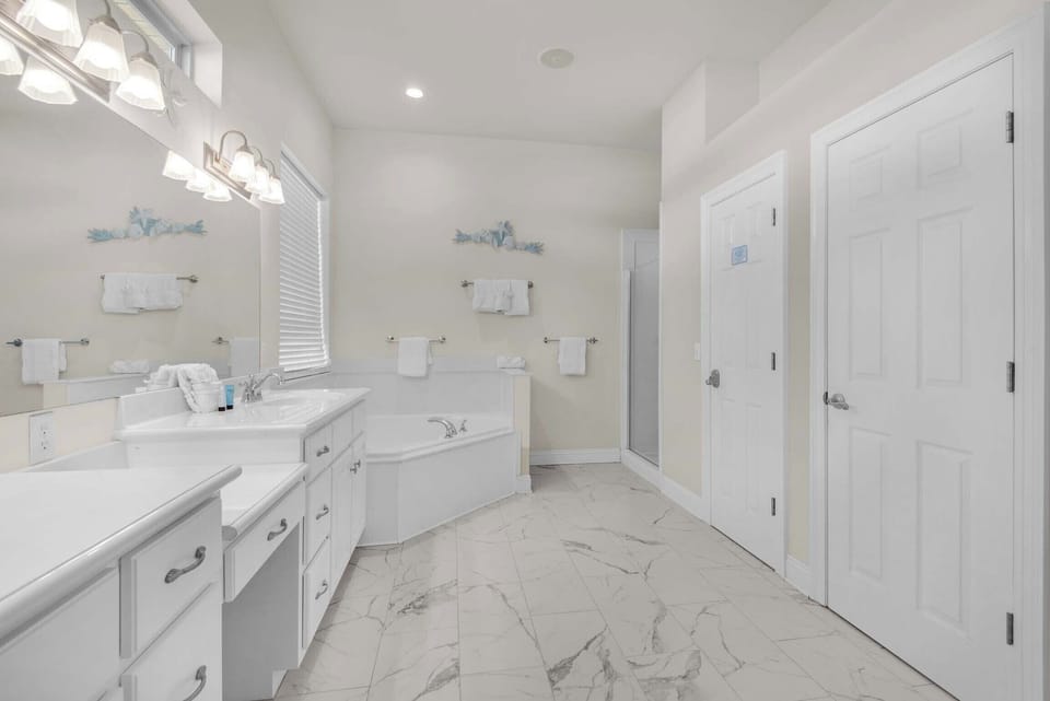 Soak in the tub in the master bathroom