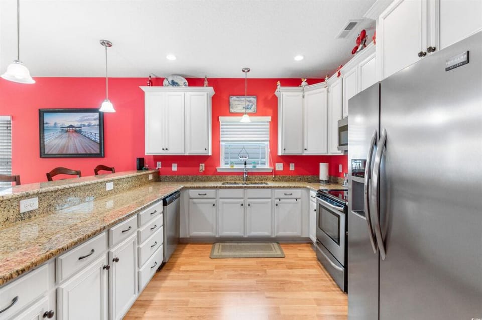 Kitchen with top appliances.
