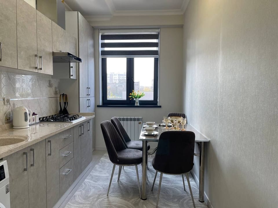 Family Condo, City View | Private kitchen | Full-size fridge, microwave, stovetop, electric kettle