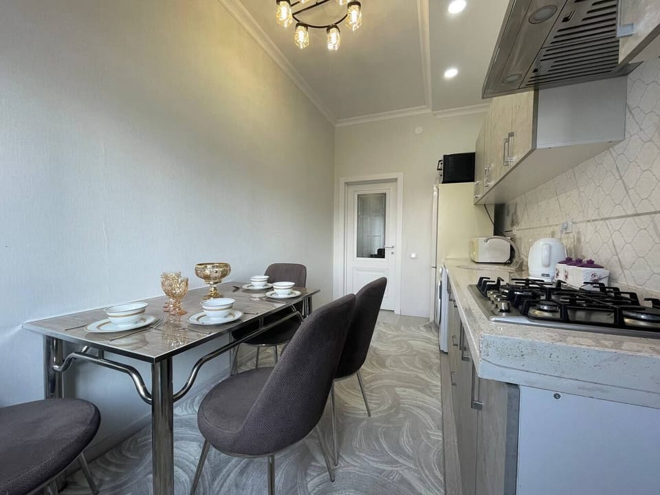 Family Condo, City View | Private kitchen | Full-size fridge, microwave, stovetop, electric kettle